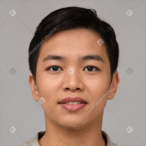 Joyful asian young-adult male with short  black hair and brown eyes