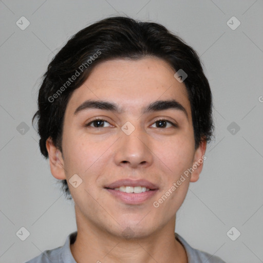 Joyful white young-adult male with short  black hair and brown eyes