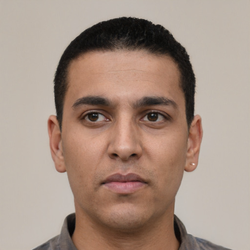 Neutral white young-adult male with short  black hair and brown eyes