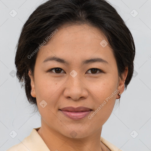 Joyful asian young-adult female with short  brown hair and brown eyes