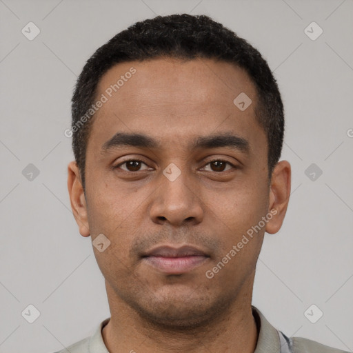 Neutral latino young-adult male with short  black hair and brown eyes