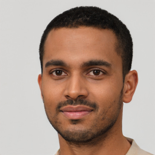 Neutral black young-adult male with short  black hair and brown eyes
