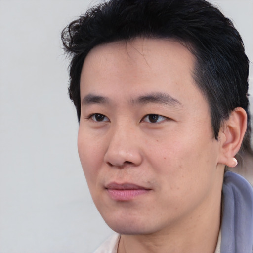 Neutral asian young-adult male with short  black hair and brown eyes
