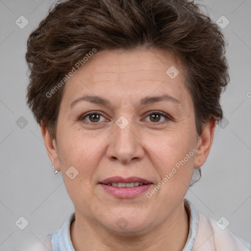 Joyful white adult female with short  brown hair and brown eyes