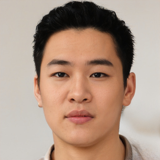 Neutral asian young-adult male with short  black hair and brown eyes