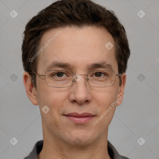 Joyful white adult male with short  brown hair and grey eyes