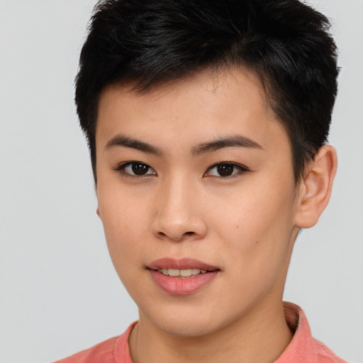 Joyful asian young-adult female with short  brown hair and brown eyes
