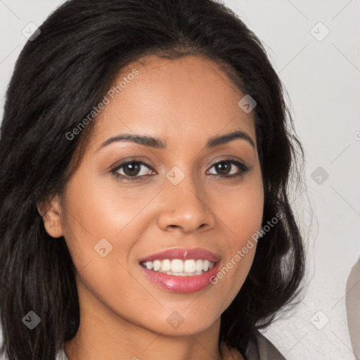 Joyful latino young-adult female with long  brown hair and brown eyes