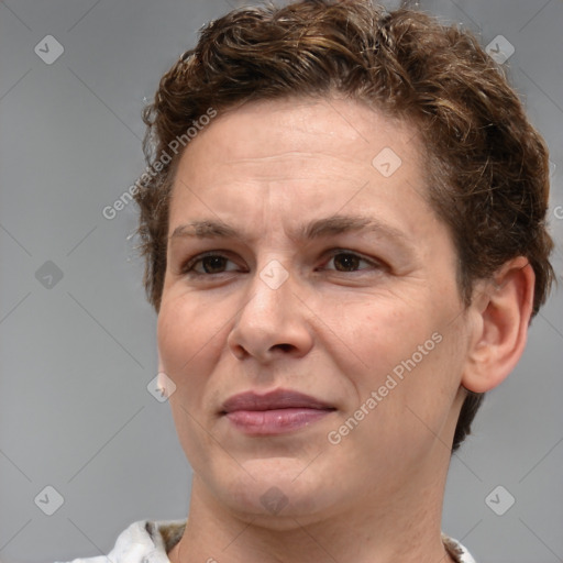 Joyful white adult female with short  brown hair and brown eyes