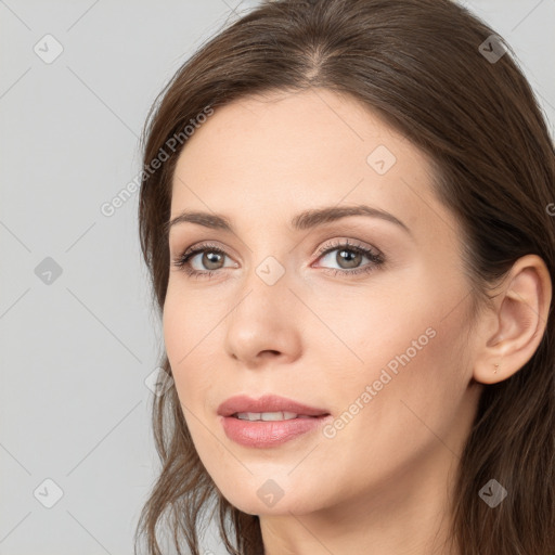 Neutral white young-adult female with long  brown hair and brown eyes