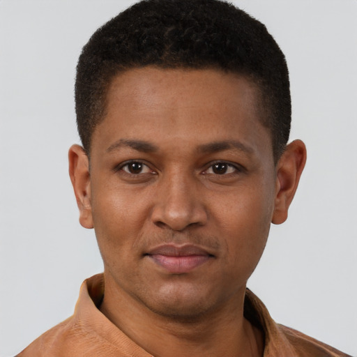 Neutral black young-adult male with short  brown hair and brown eyes