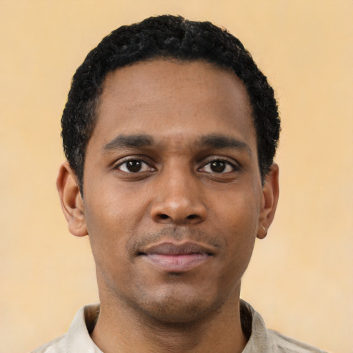 Neutral black young-adult male with short  black hair and brown eyes