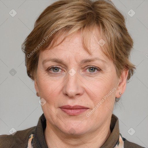 Joyful white adult female with medium  brown hair and grey eyes