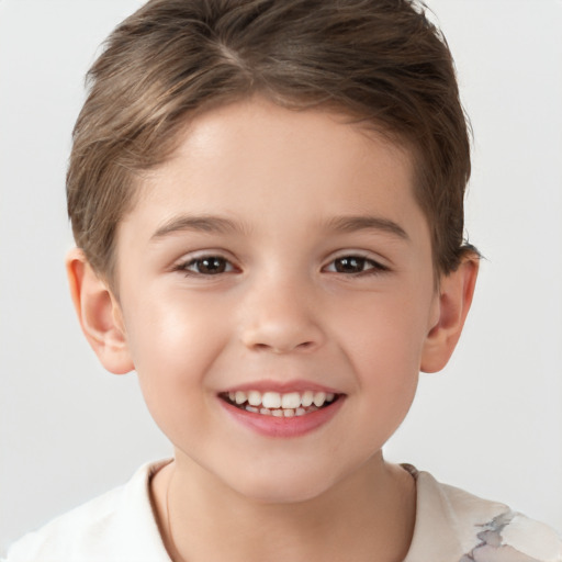 Joyful white child male with short  brown hair and brown eyes