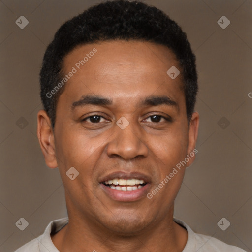 Joyful black young-adult male with short  black hair and brown eyes