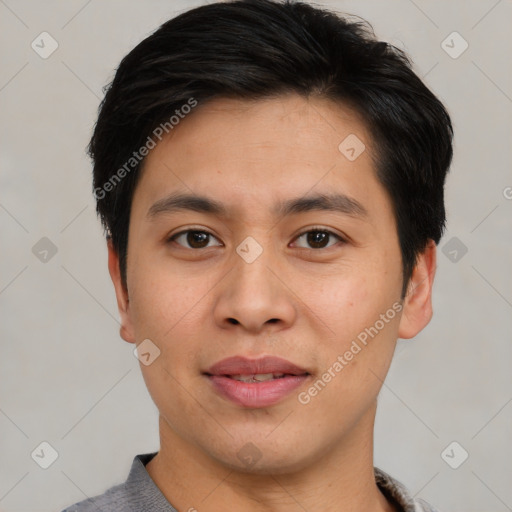 Joyful asian young-adult male with short  brown hair and brown eyes