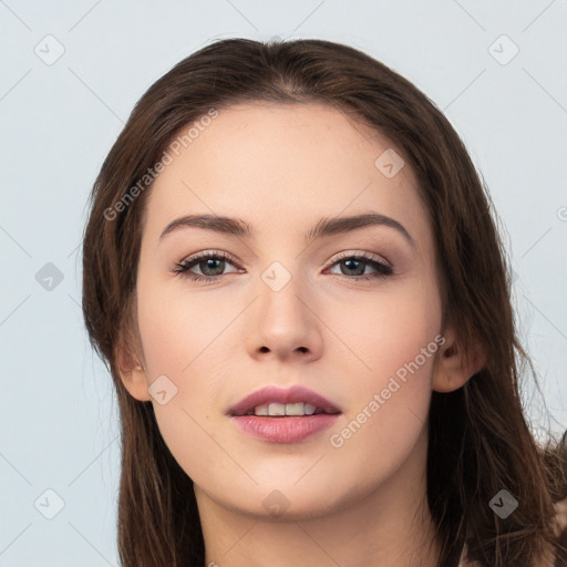 Neutral white young-adult female with long  brown hair and brown eyes