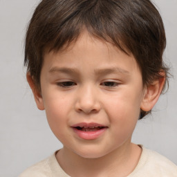 Joyful white child male with short  brown hair and brown eyes