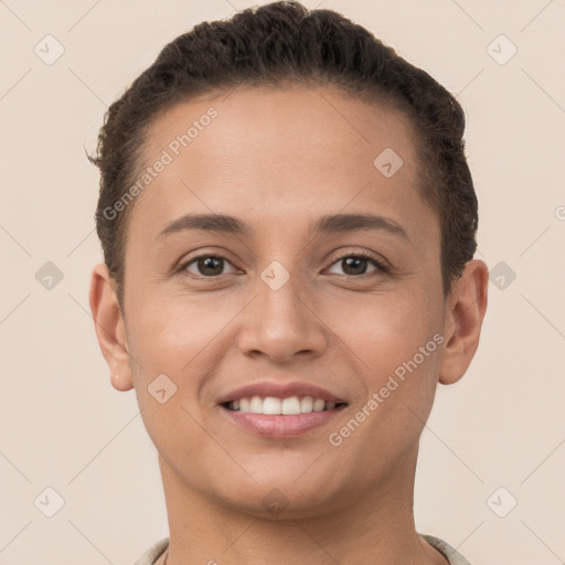 Joyful white young-adult female with short  brown hair and brown eyes