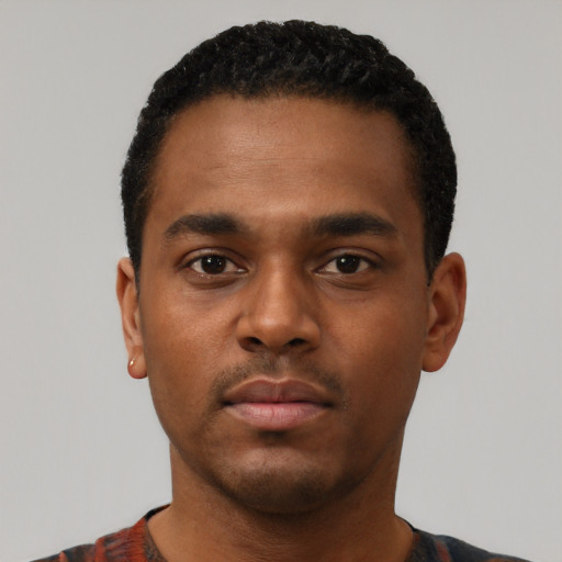 Neutral black young-adult male with short  black hair and brown eyes