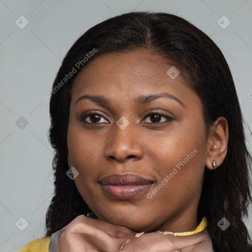 Joyful black young-adult female with medium  brown hair and brown eyes