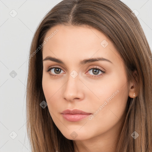 Neutral white young-adult female with long  brown hair and brown eyes