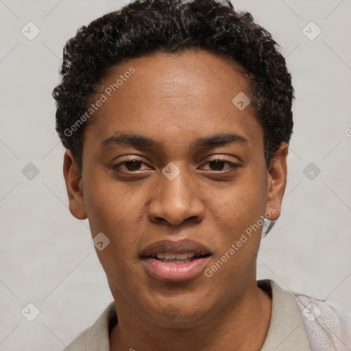 Joyful black young-adult male with short  brown hair and brown eyes