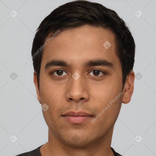 Neutral latino young-adult male with short  black hair and brown eyes