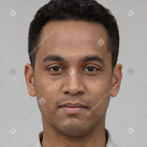 Neutral latino young-adult male with short  black hair and brown eyes