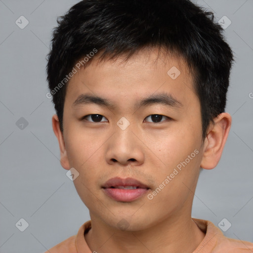 Neutral asian young-adult male with short  brown hair and brown eyes