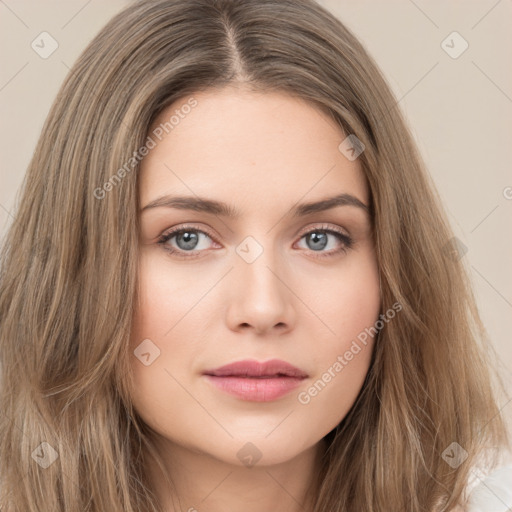 Neutral white young-adult female with long  brown hair and brown eyes