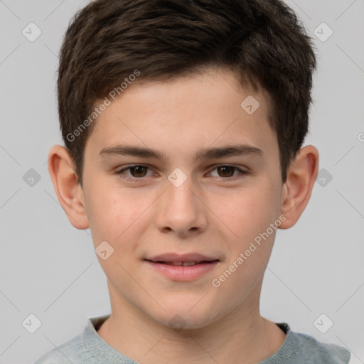 Joyful white child male with short  brown hair and brown eyes