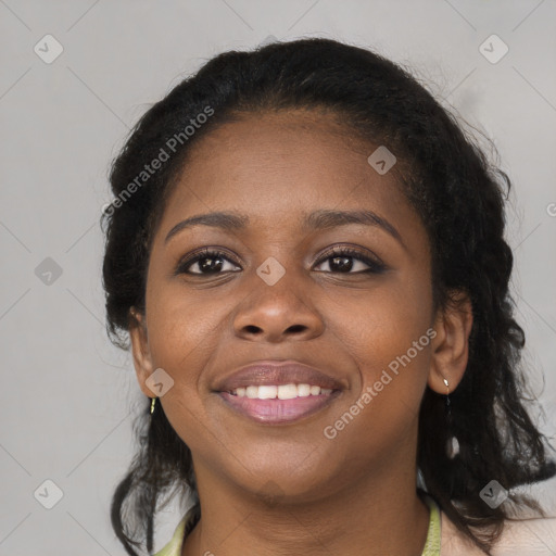 Joyful black young-adult female with medium  black hair and brown eyes