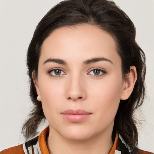 Neutral white young-adult female with medium  brown hair and brown eyes