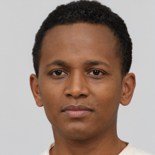 Neutral latino young-adult male with short  brown hair and brown eyes