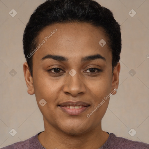 Joyful black young-adult female with short  black hair and brown eyes