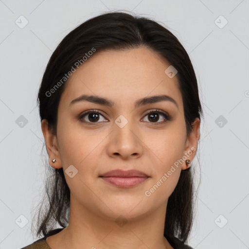 Joyful latino young-adult female with medium  brown hair and brown eyes