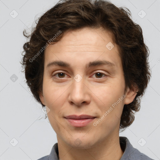 Joyful white young-adult male with medium  brown hair and brown eyes