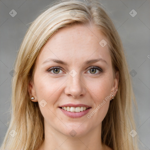 Joyful white young-adult female with long  brown hair and grey eyes