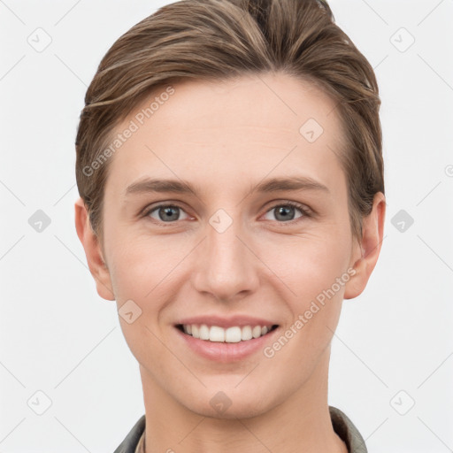 Joyful white young-adult female with short  brown hair and grey eyes