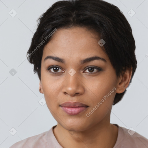 Joyful latino young-adult female with short  black hair and brown eyes