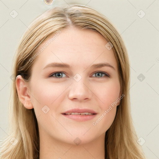 Joyful white young-adult female with long  brown hair and blue eyes