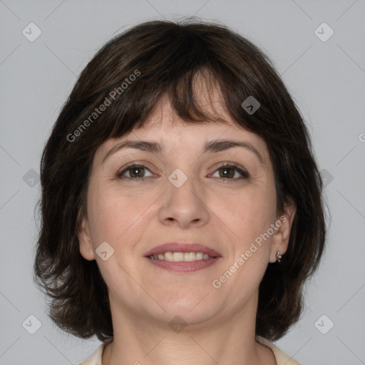 Joyful white adult female with medium  brown hair and brown eyes