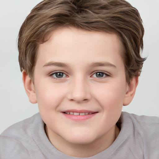 Joyful white child female with short  brown hair and brown eyes