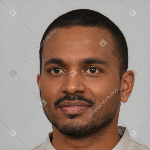 Neutral black young-adult male with short  black hair and brown eyes