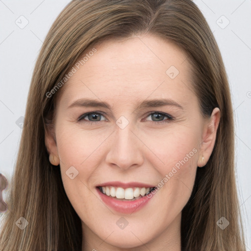 Joyful white young-adult female with long  brown hair and grey eyes