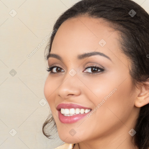 Joyful white young-adult female with medium  brown hair and brown eyes