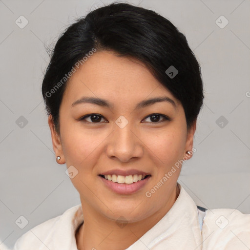 Joyful asian young-adult female with short  black hair and brown eyes