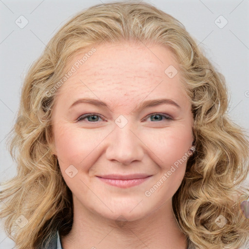 Joyful white young-adult female with long  brown hair and blue eyes