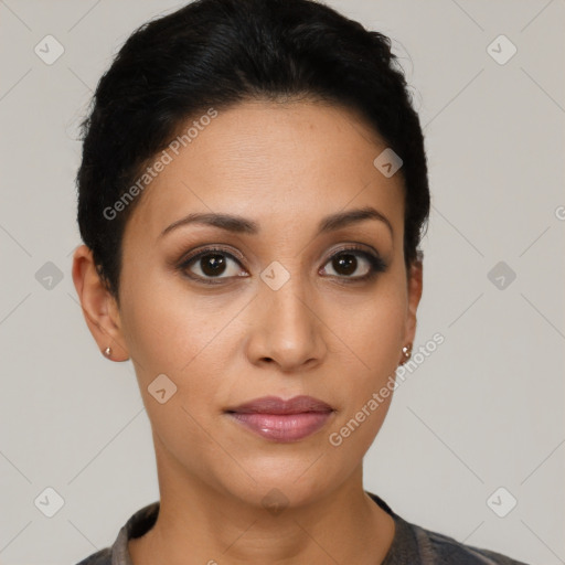 Joyful latino young-adult female with short  black hair and brown eyes